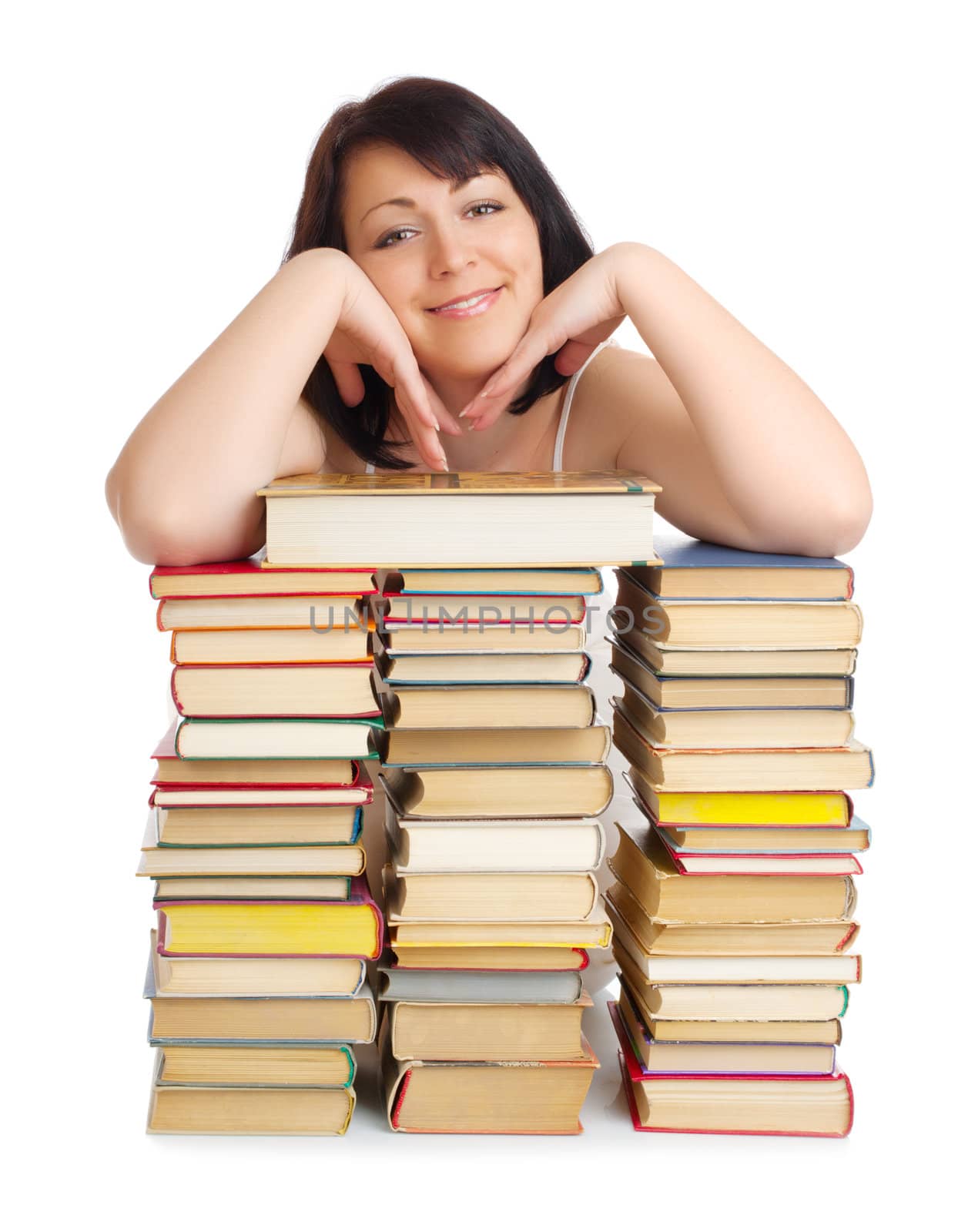 Young smiling woman with heap of books isolated