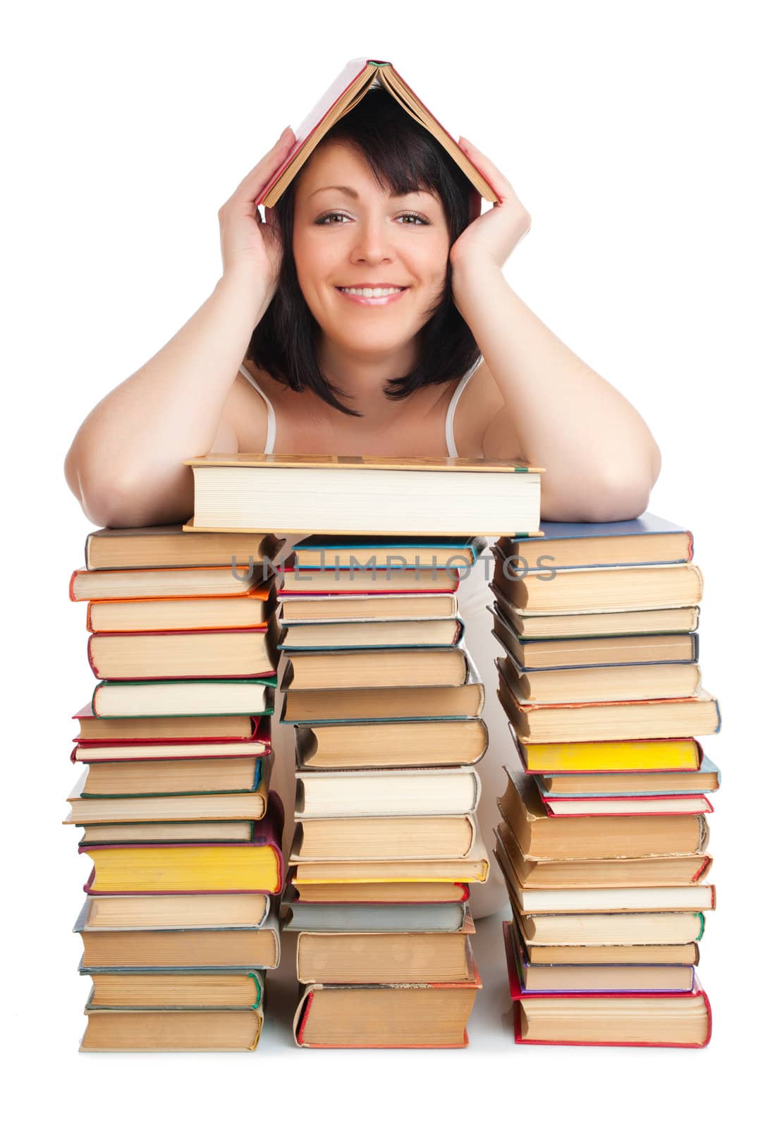 Young smiling woman with heap of books isolated