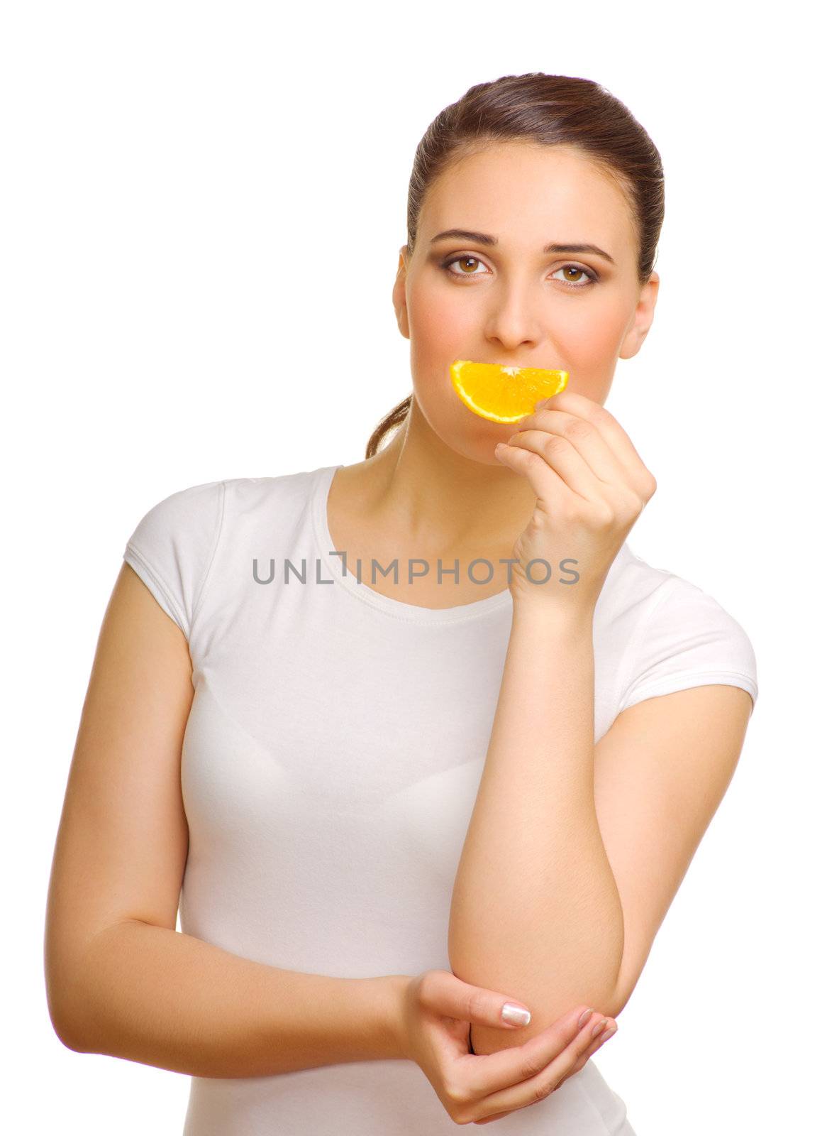 Young girl with orange slice isolated