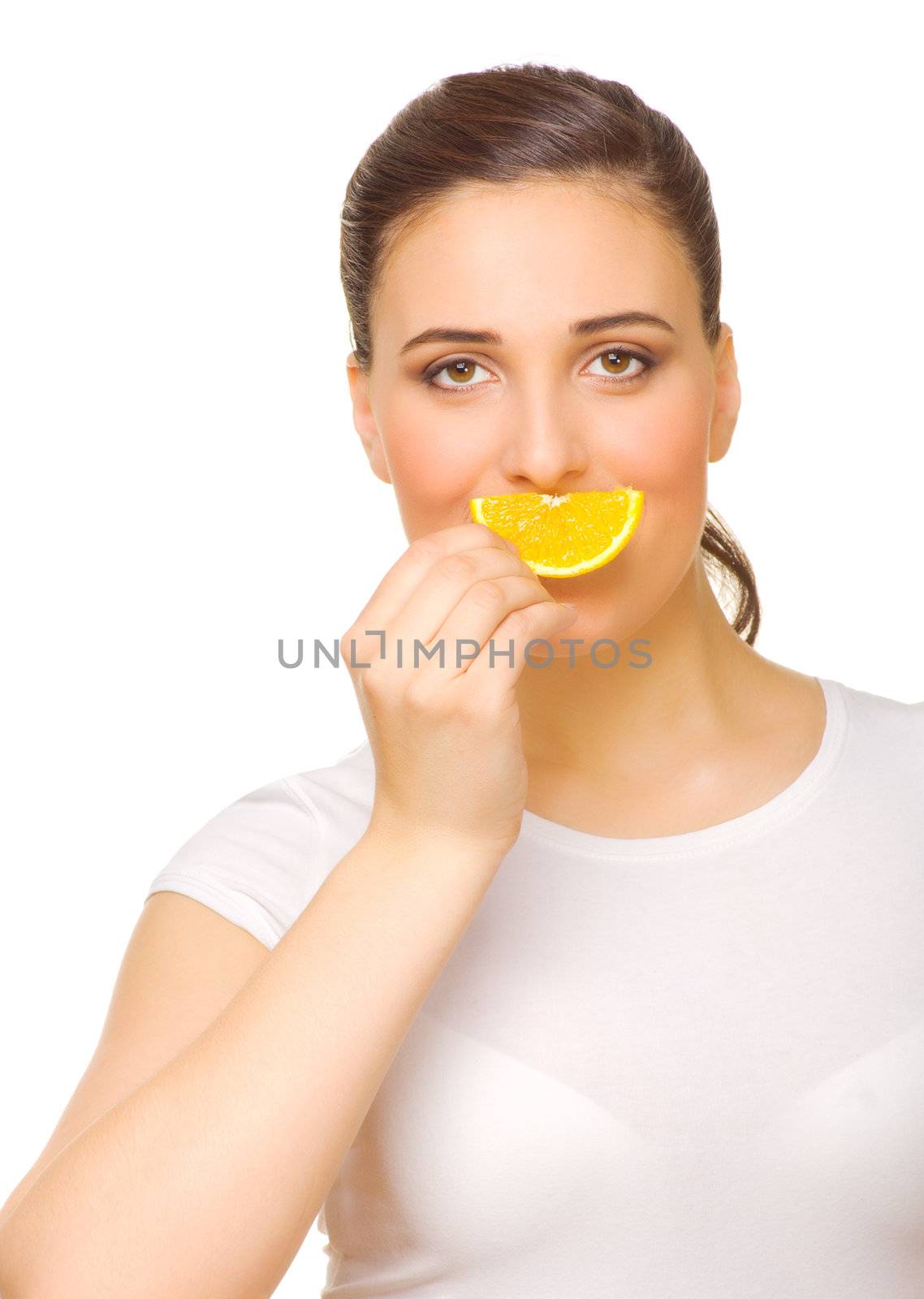 Young girl with slice of orange isolated