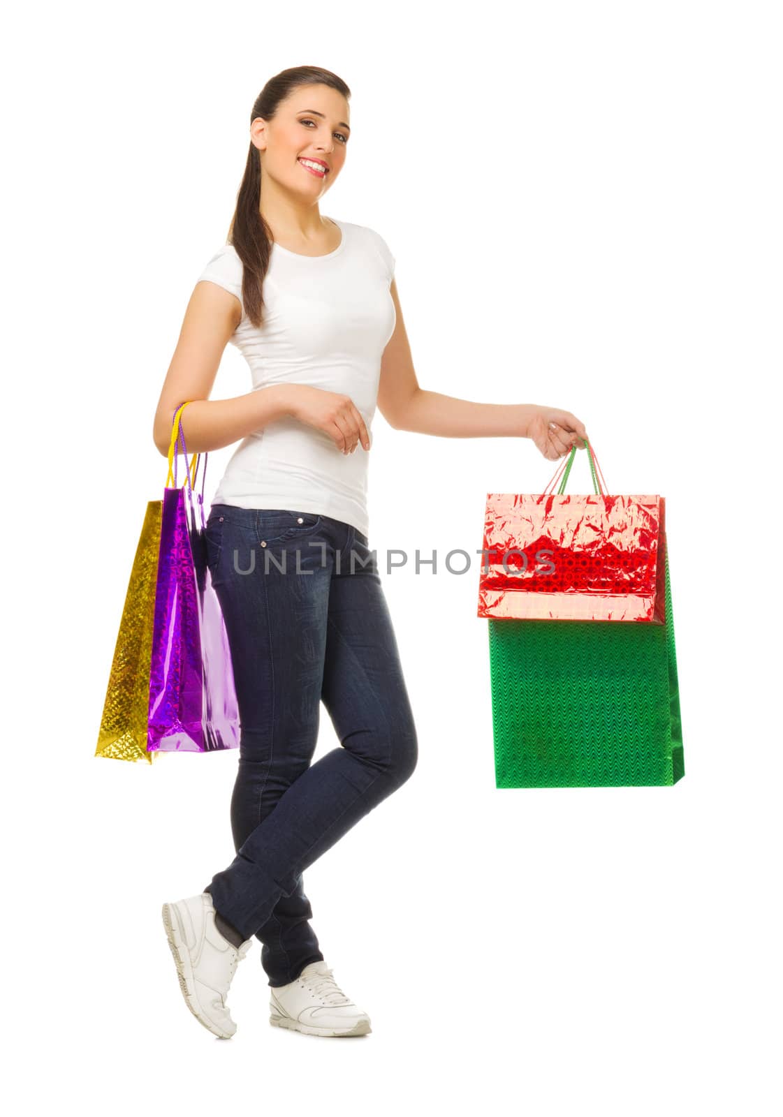 Young woman with bags isolated