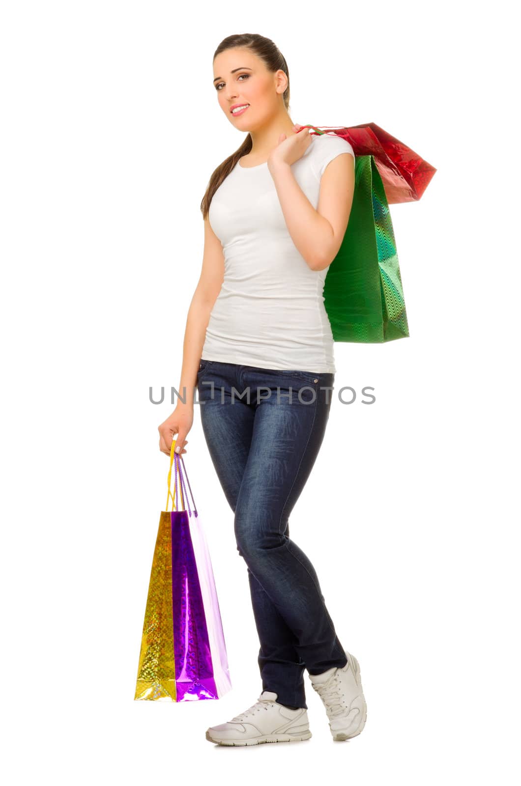 Young woman with bags isolated