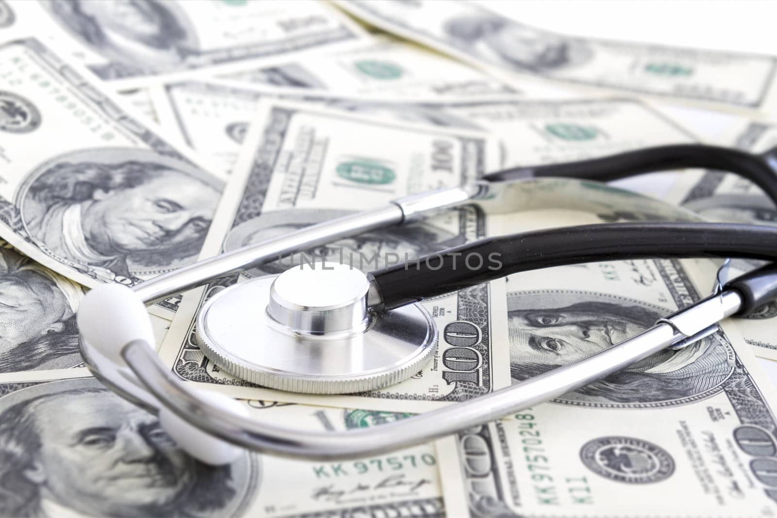 Money and stethoscope, medical insurance by manaemedia