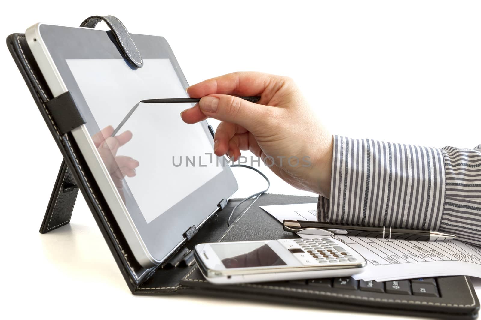 Business woman hand typing on touch screen of digital tablet