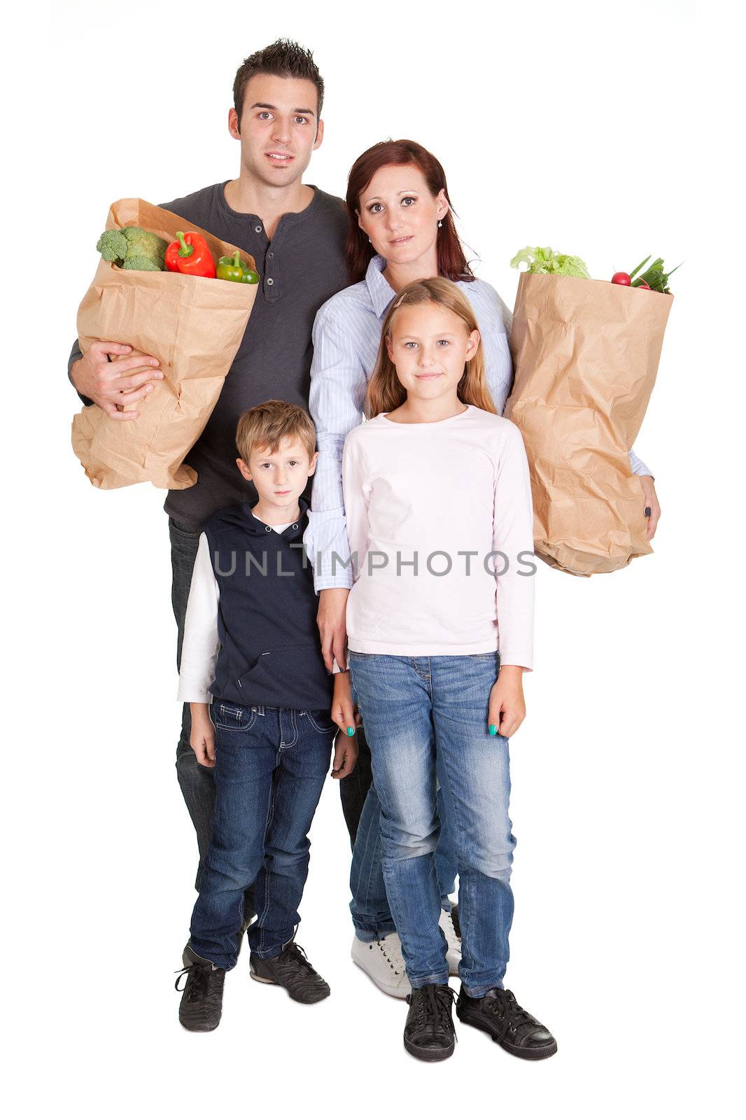 Happy family with grocery shopping bags. Isolated on white