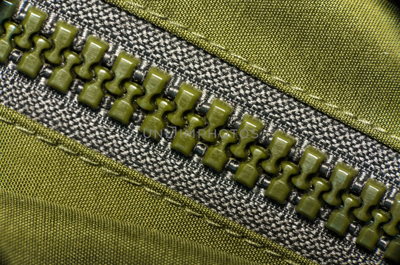 macro of green plastic zipper by Shane9