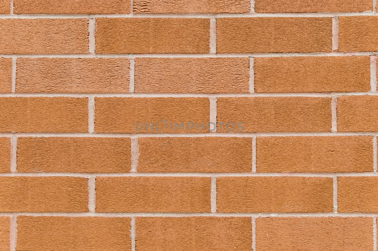 Orange rough brick wall background by Shane9