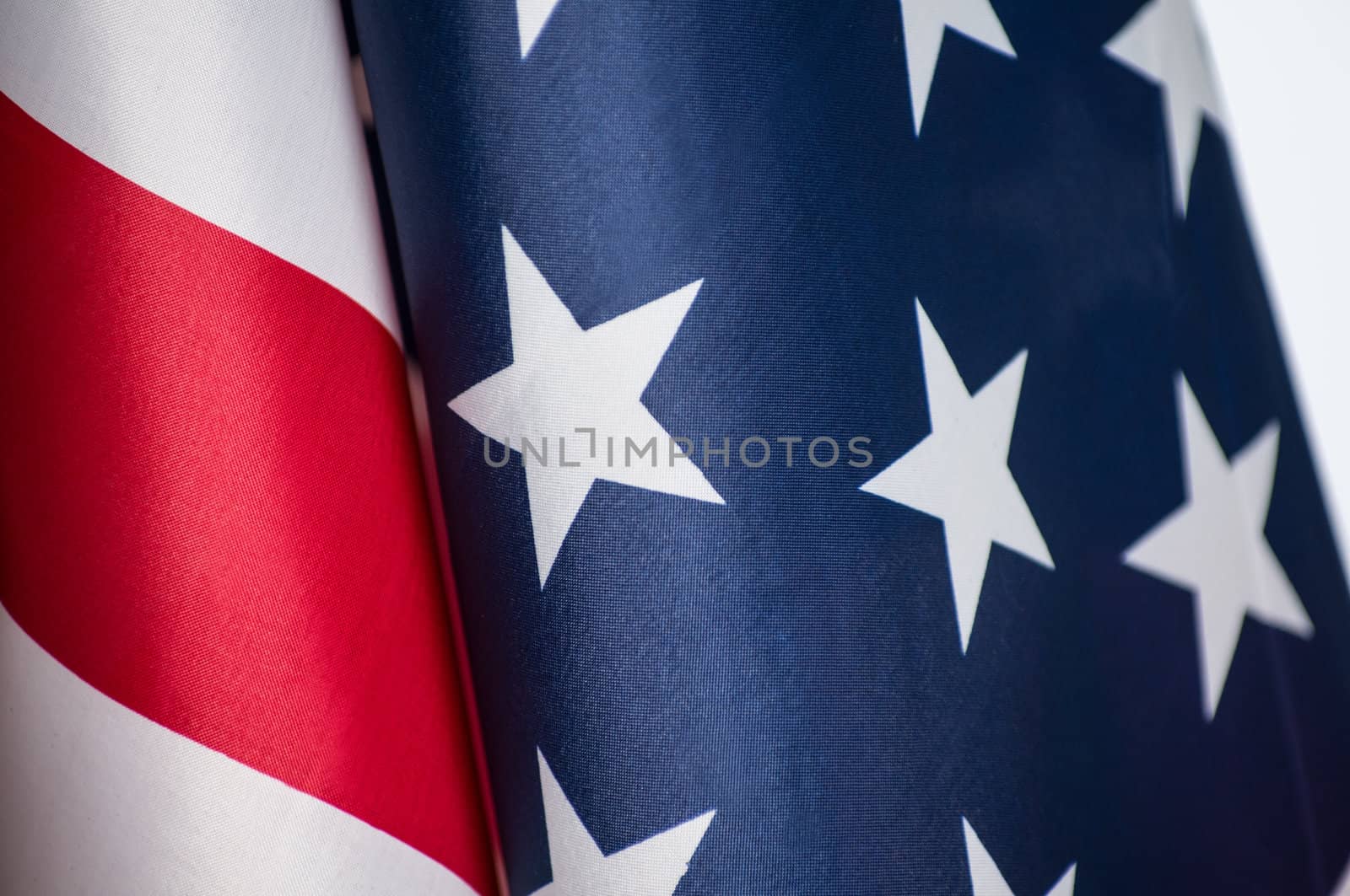 American flag shot by itself on white.