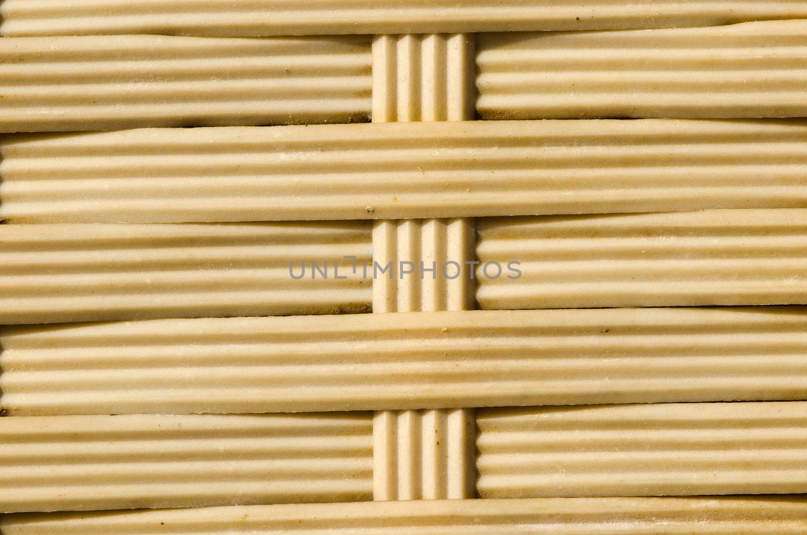 yellow rubber straps weaved basket background
