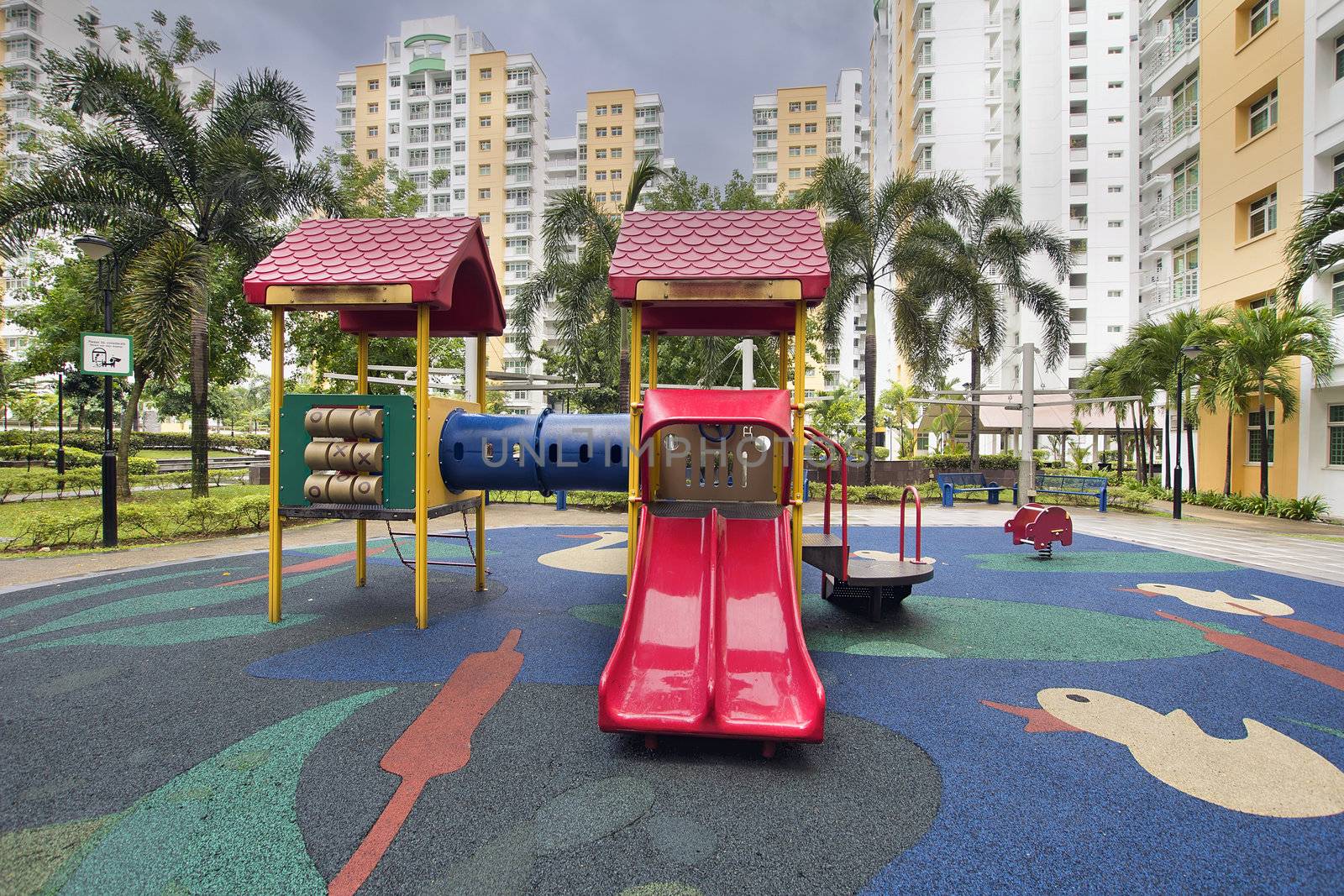 Rubber Ducky Theme Children Playground with Red Slides in Public Housing in Singapore Punggol District