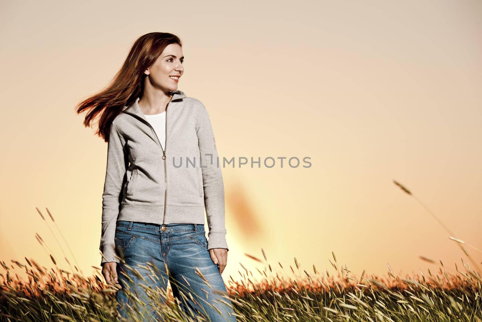 Outdoor portrait of a beautiful woman on a summer day