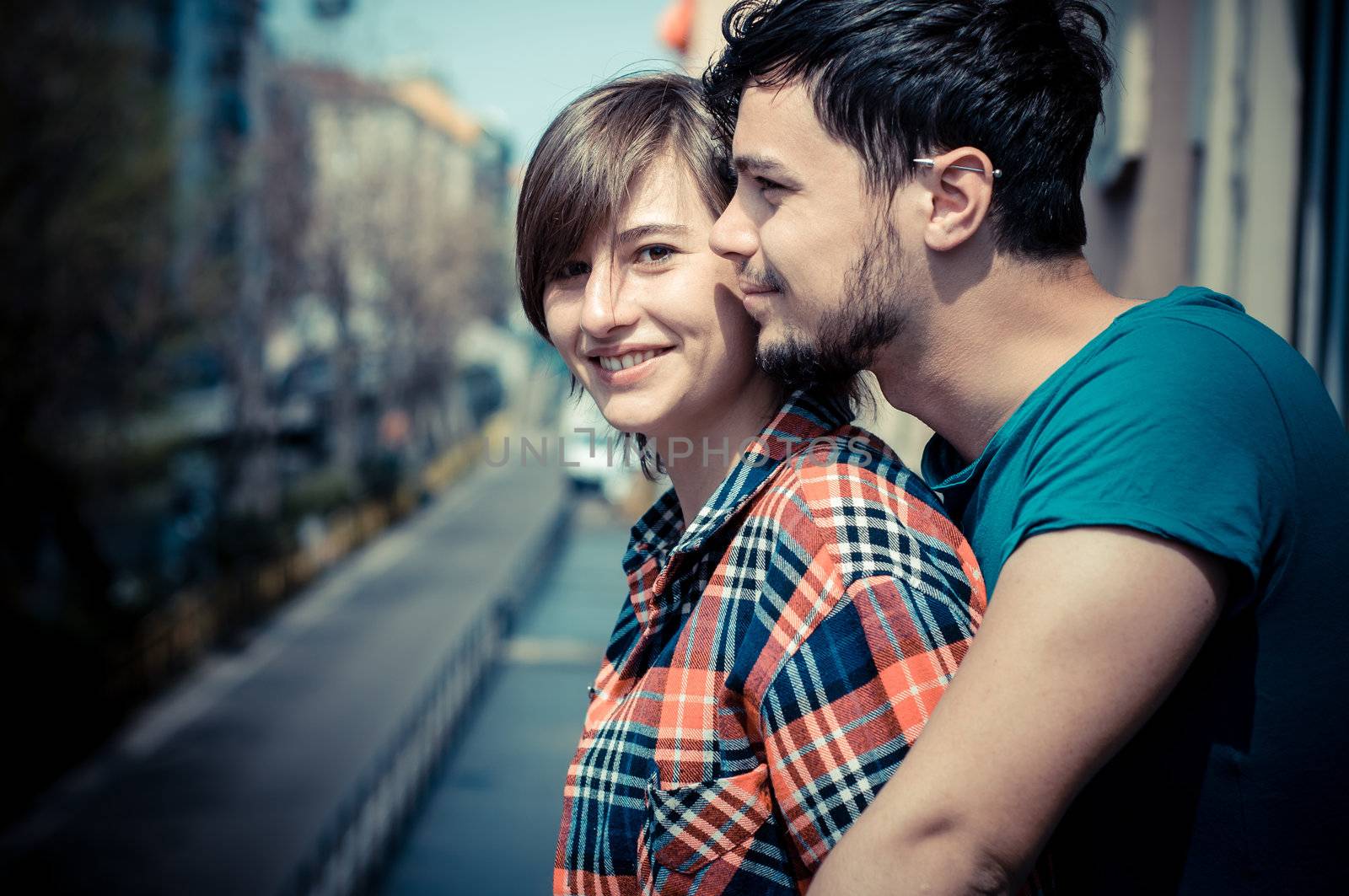 couple embracing on balcony