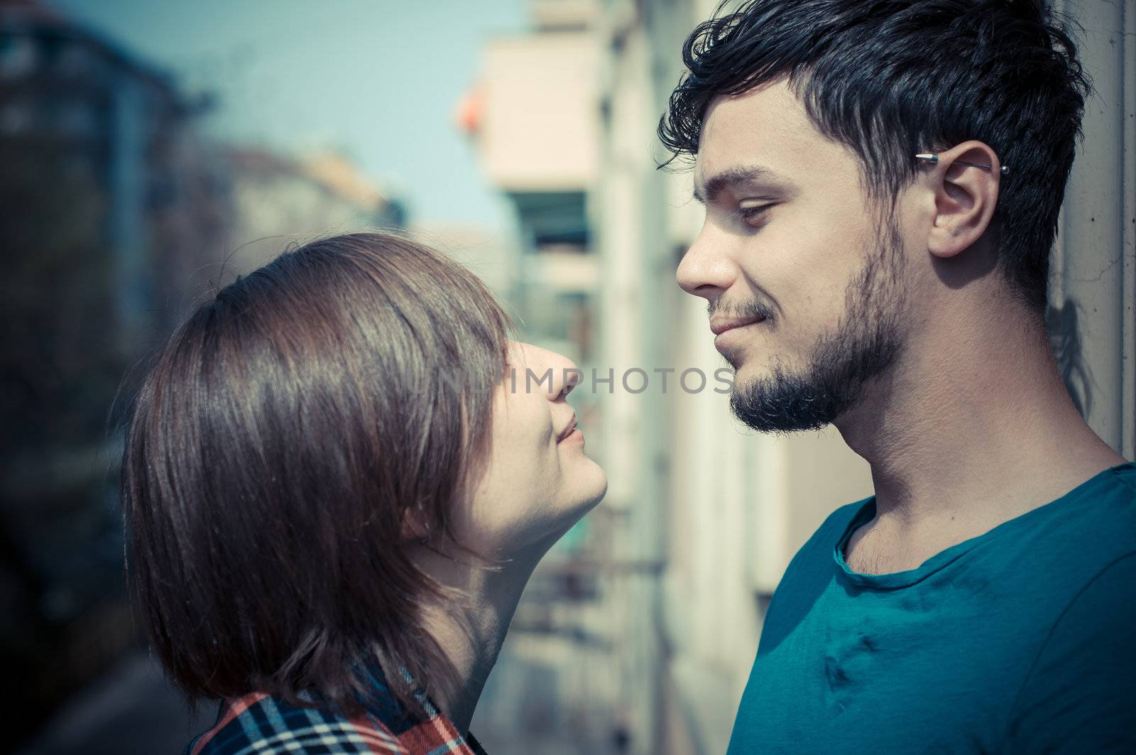 couple embracing on balcony