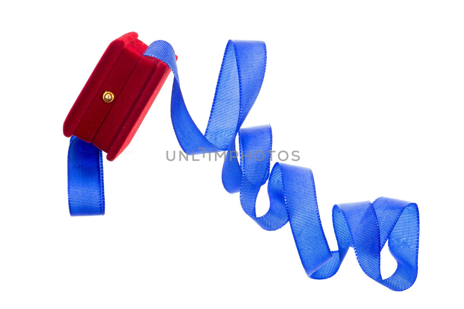 Red velvet gift box and blue ribbon on a white background