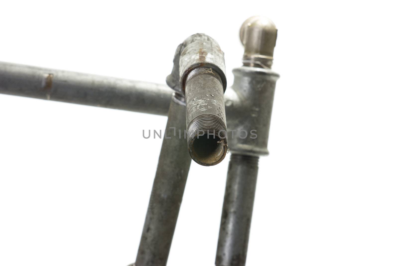 The construction of metal connectors and water pipes on a white background