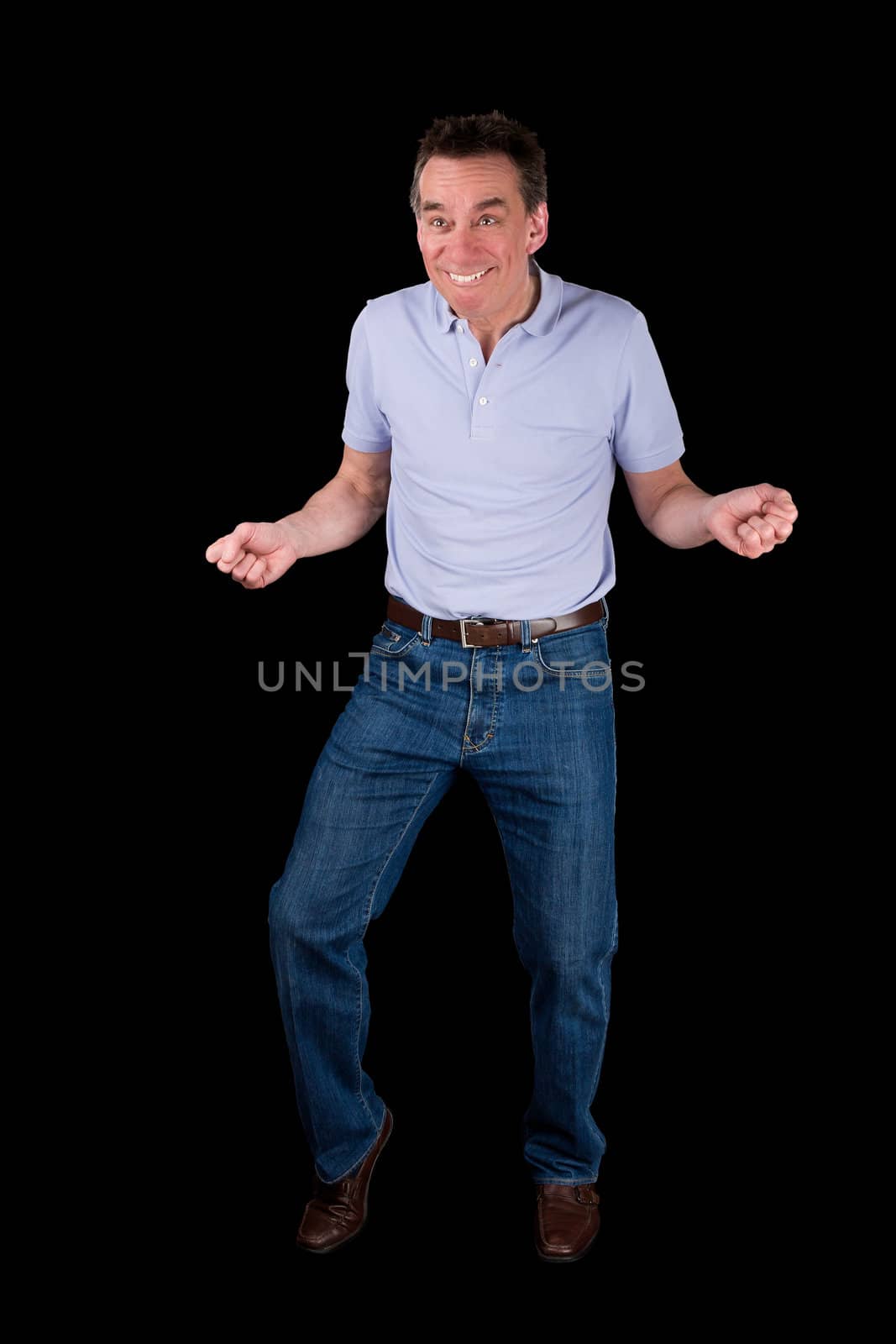 Funny Middle Age Man doing Silly Dance Black Background