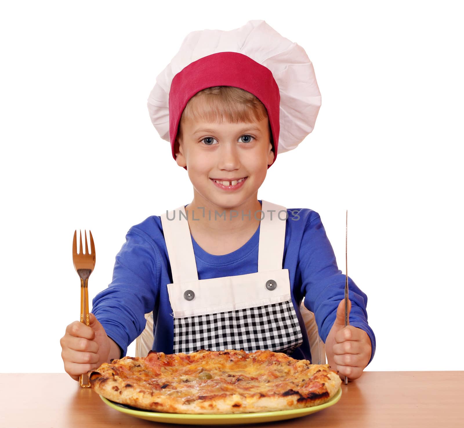 happy boy chef eat pizza