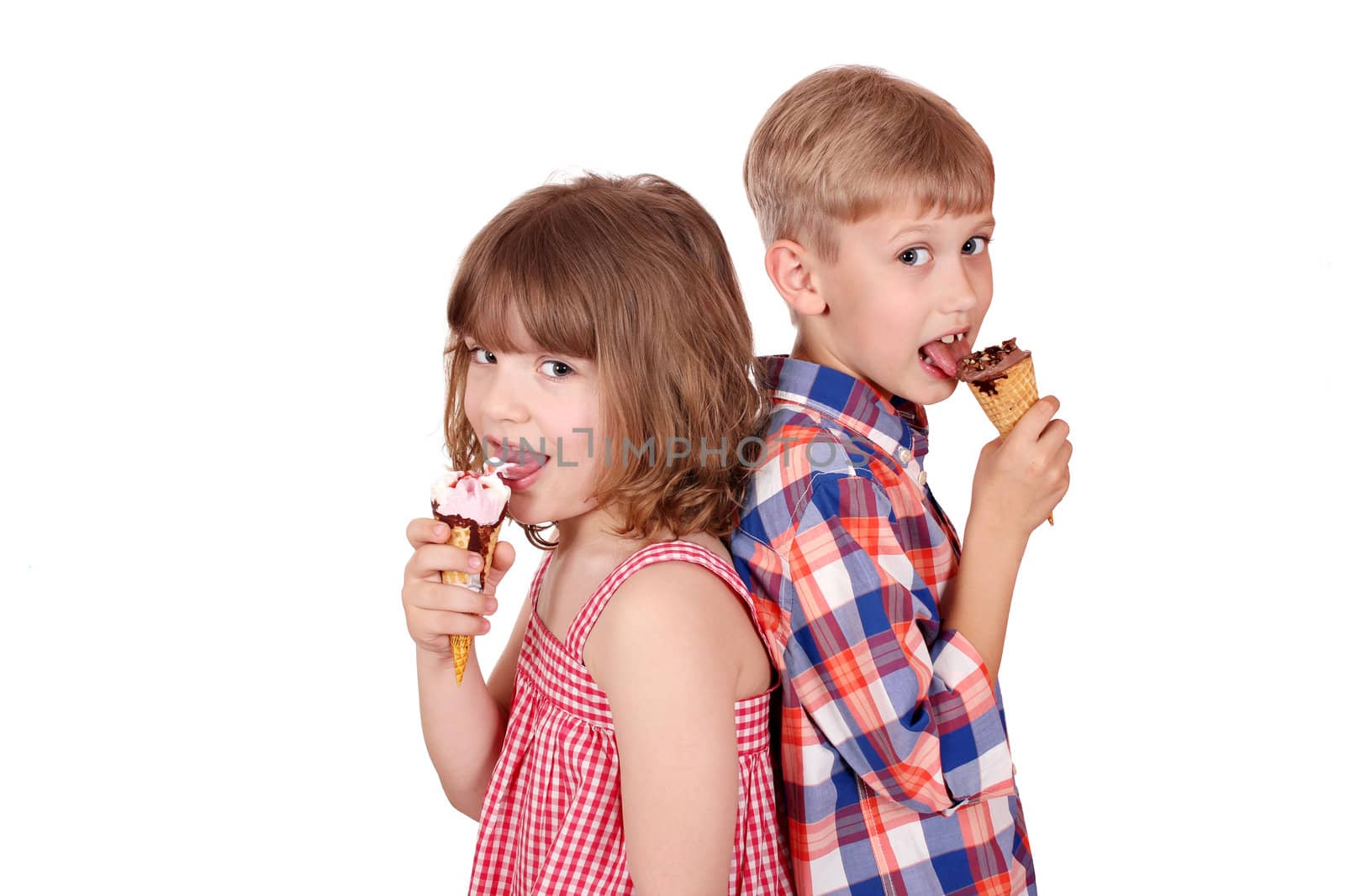 little girl and boy eating ice cream by goce