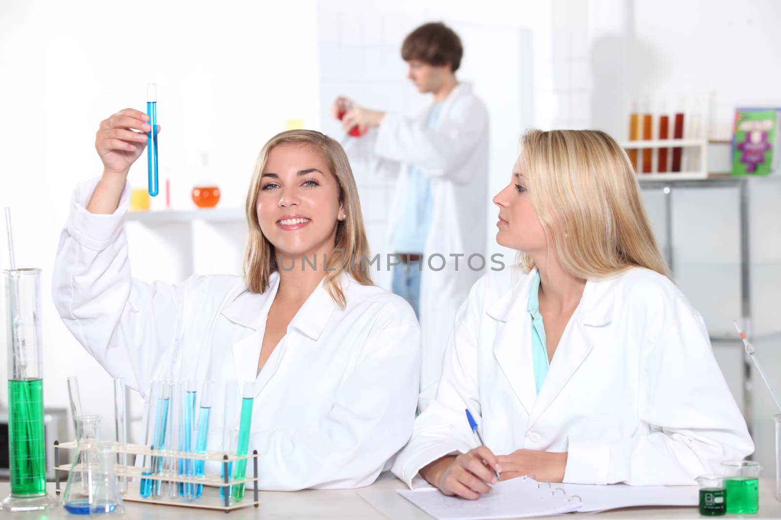 Students in a chemistry class by phovoir