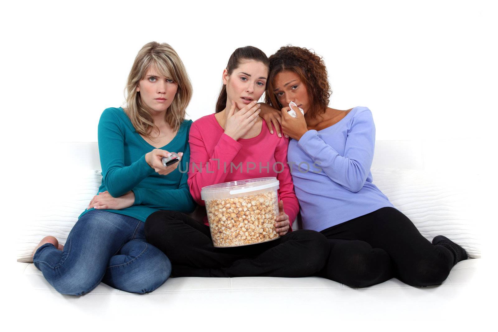 trio of girls crying over sad movie by phovoir