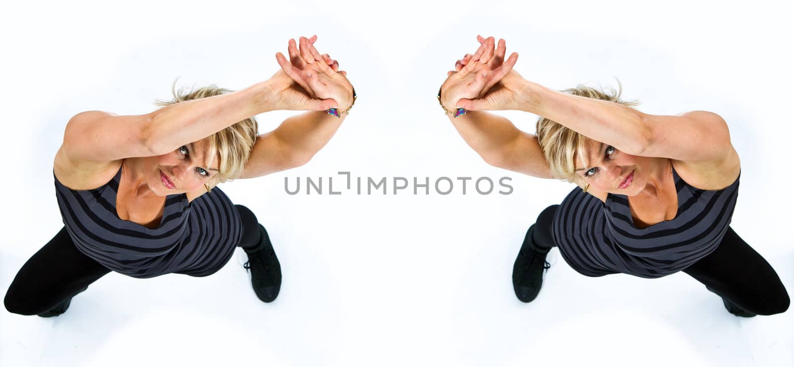 Blonde cute girl dancing shot with flash