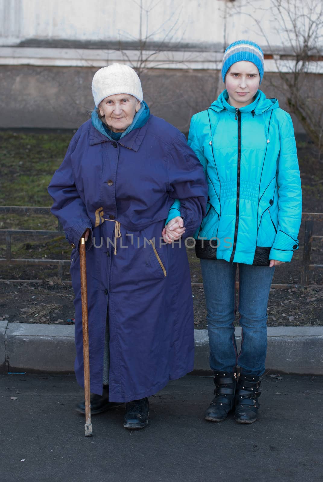 Grandmother and granddaughter for a walk.