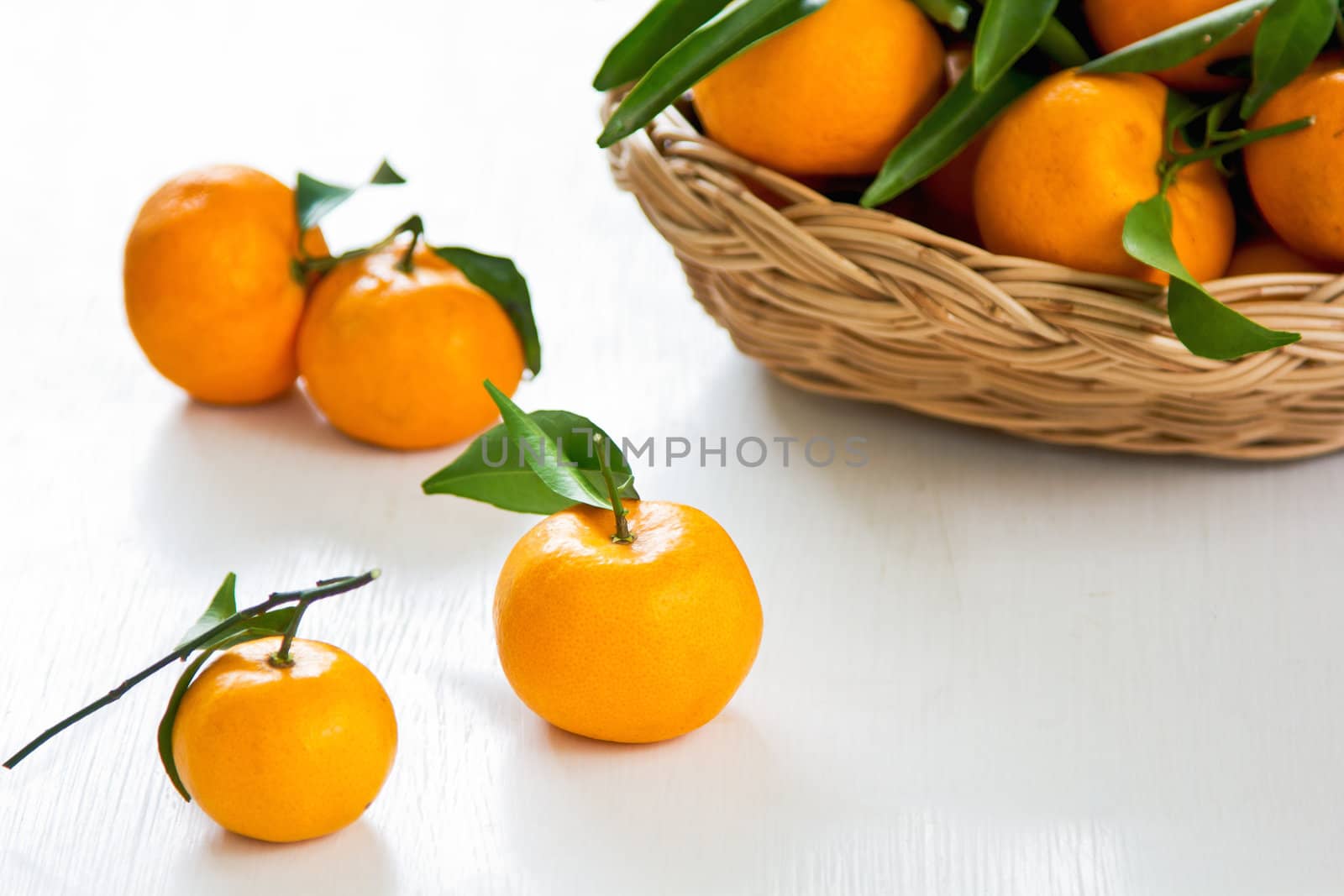 Fresh oranges in a bamboo basket