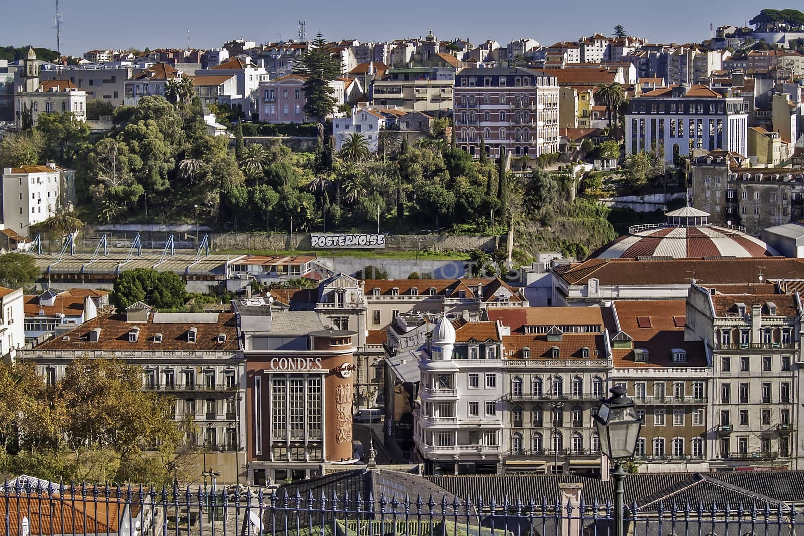 General view of Lisbon downtown and hills from Bairro Alto district, with the ancient cinema Condes, today the Hard Rock Cafe