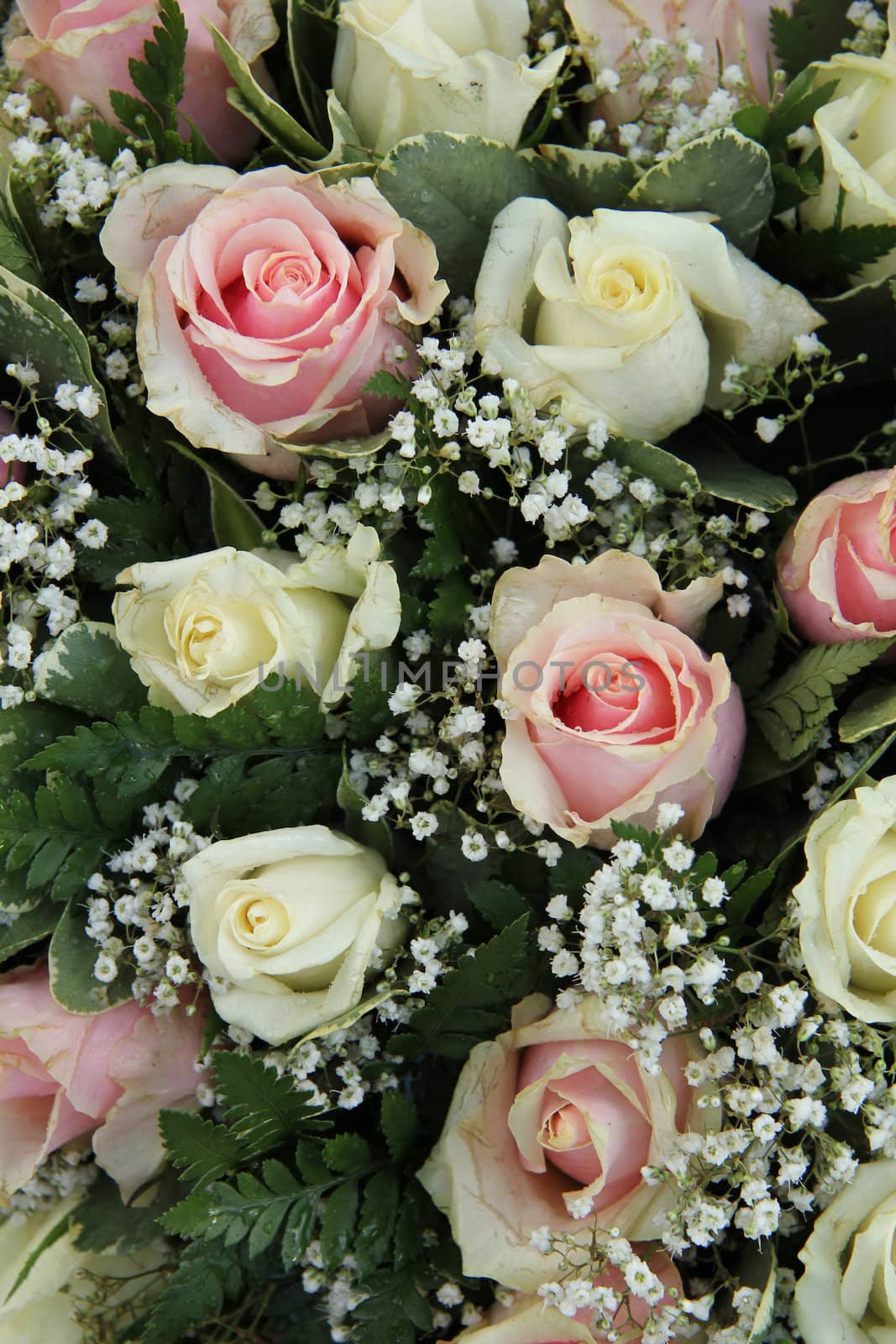 Wedding flowers in pink and white roses and gypsophila