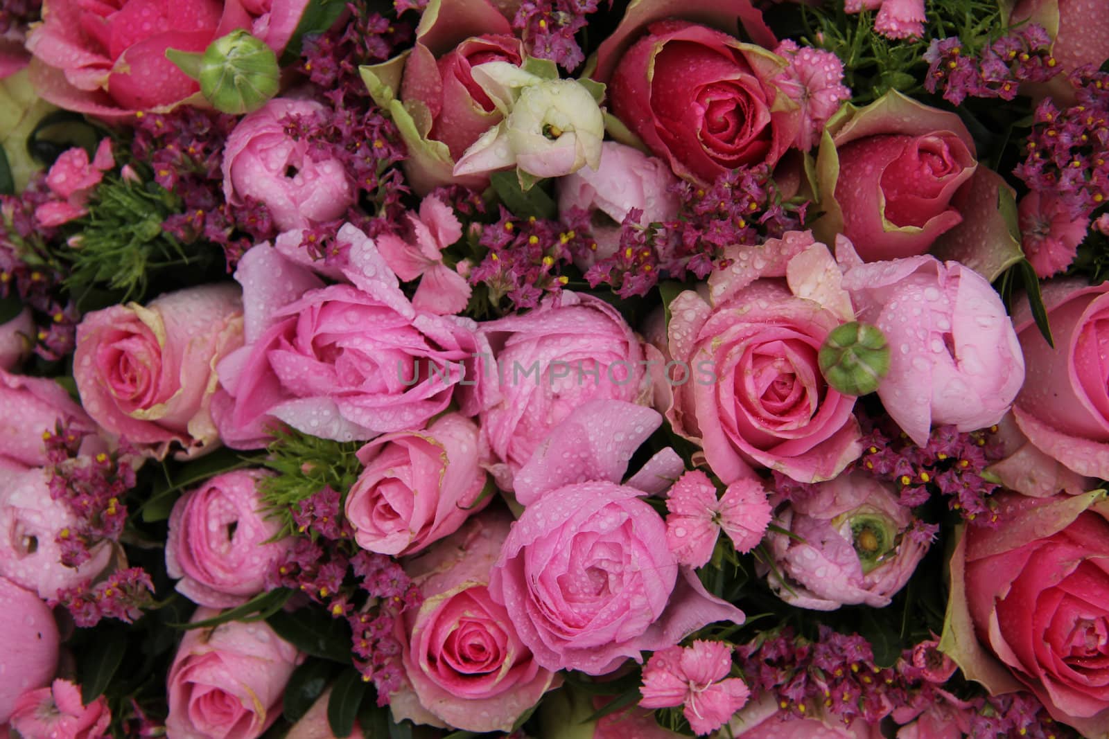 Mixed pink wedding arrangement, various flowers