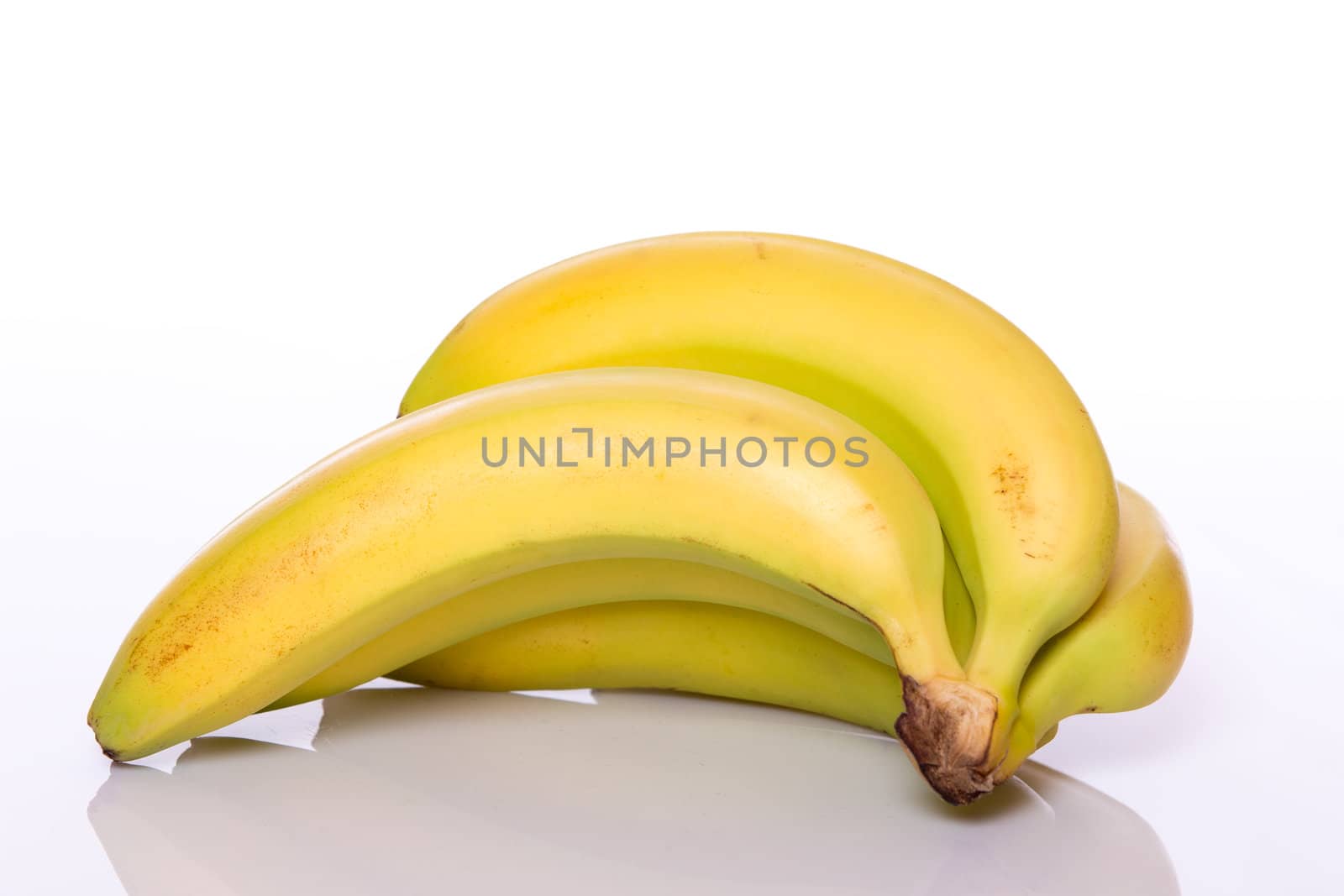 Bunch of bananas on white background close-up