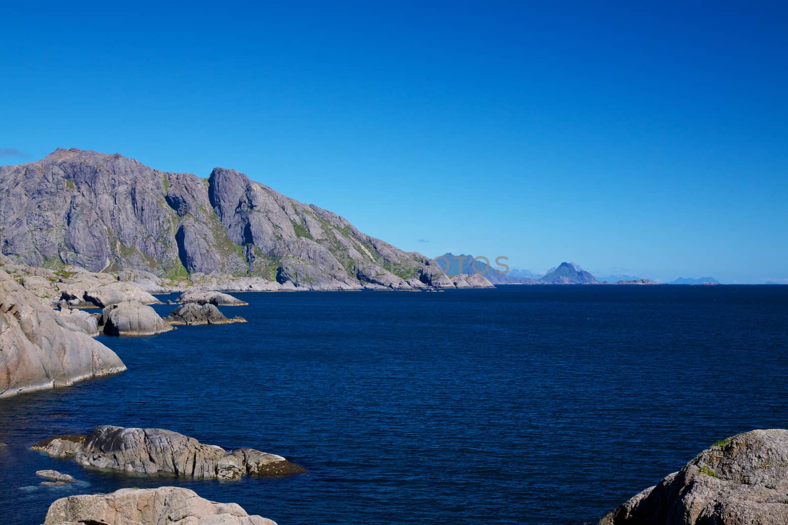 Rocky norwegian coastline on Lofoten islands in summer