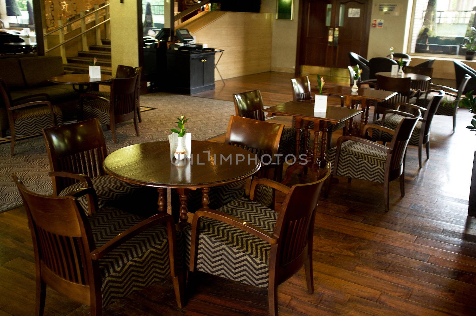 Luxurious dining area of a hotel. Tables for few