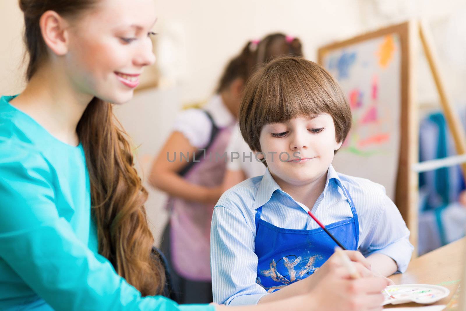 teacher and student in the classroom by adam121