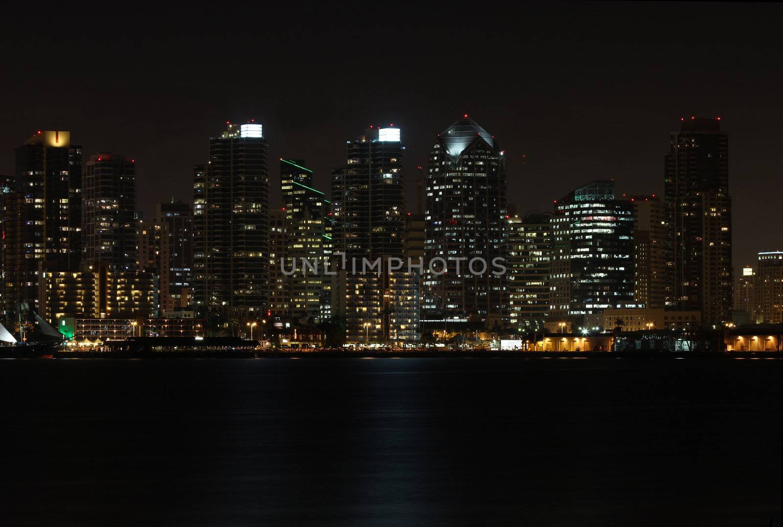 View of a partial skyline of San Diego, California from the water at night