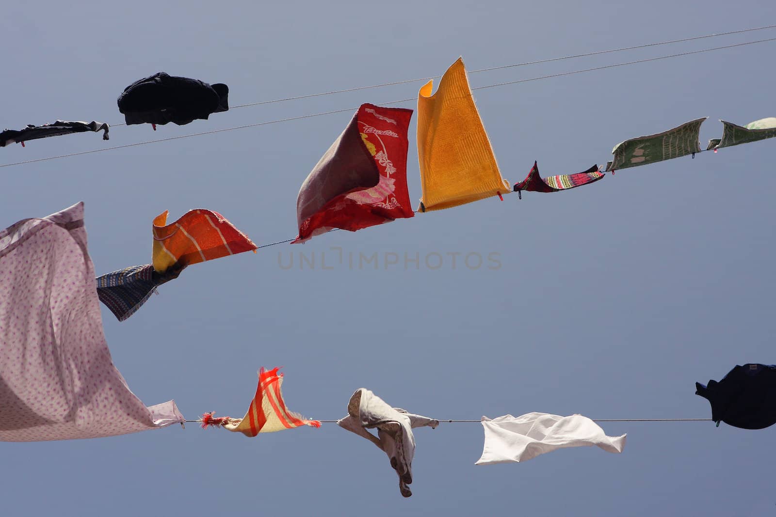 Drying laundry on a clothesline against the sky Lviv by cococinema