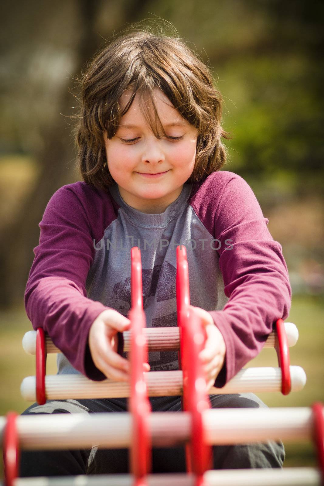 Young boy on a teeterboard