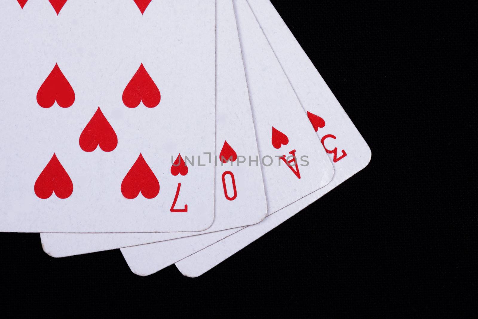 love playing cards isolated on a black background,