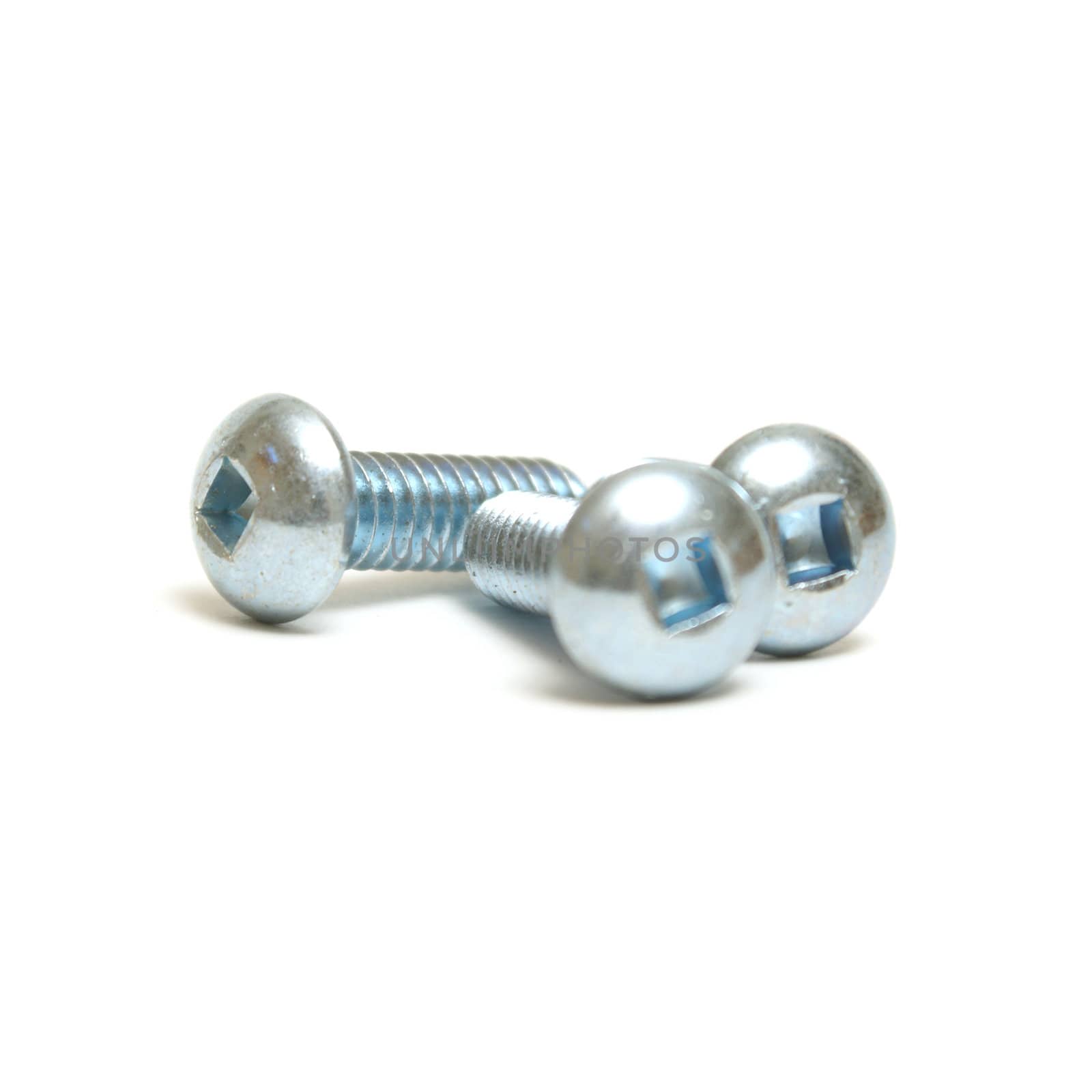 An isolated shot of a few screws.