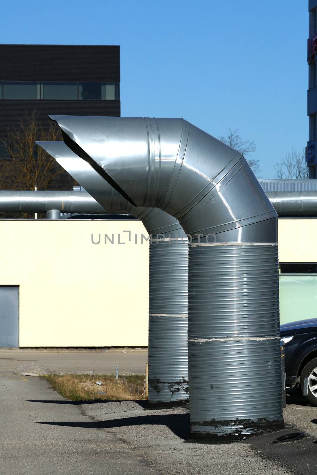 Greater pipes of ventilation are near a building