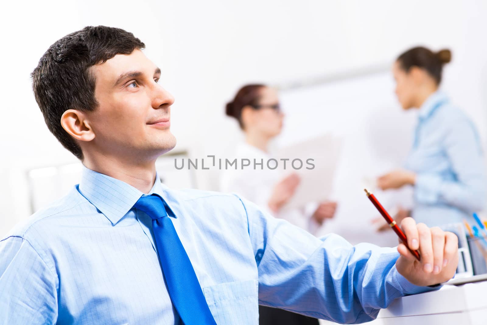 Portrait of a businessman in a blue shirt by adam121