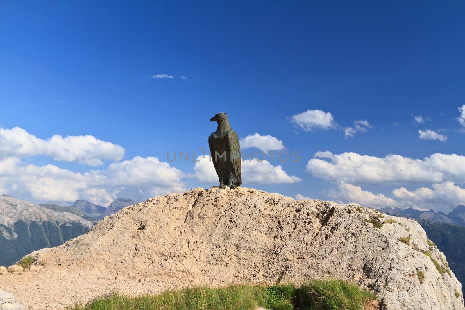 bronze eagle over Costalunga pass, Trentino, Italy