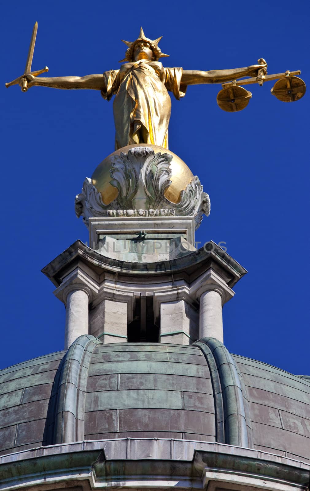 Lady Justice Statue ontop of the Old Bailey in London by chrisdorney