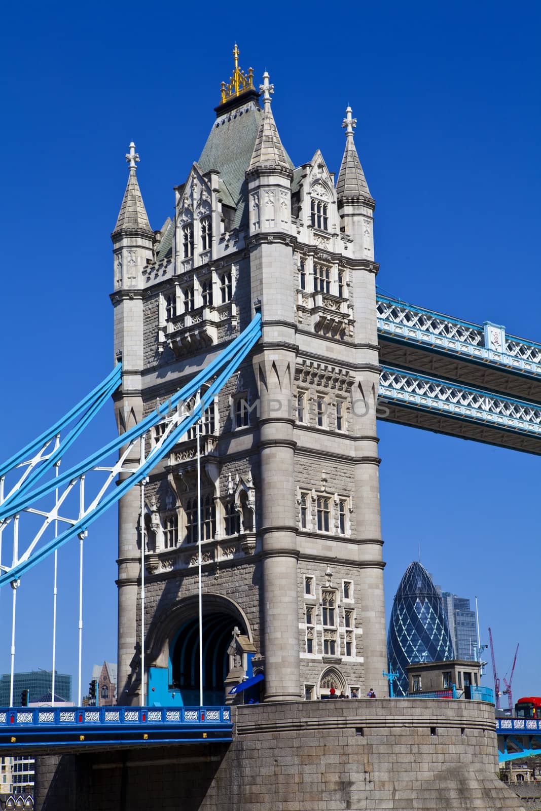 Tower Bridge in London with the Gherkin in London.