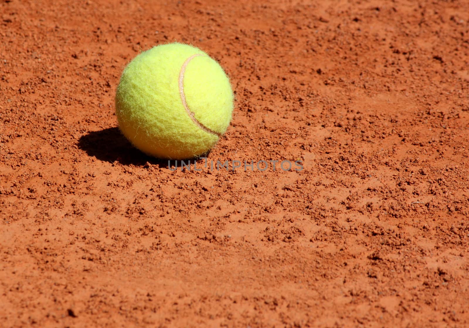 ball lying on tennis court by romantiche