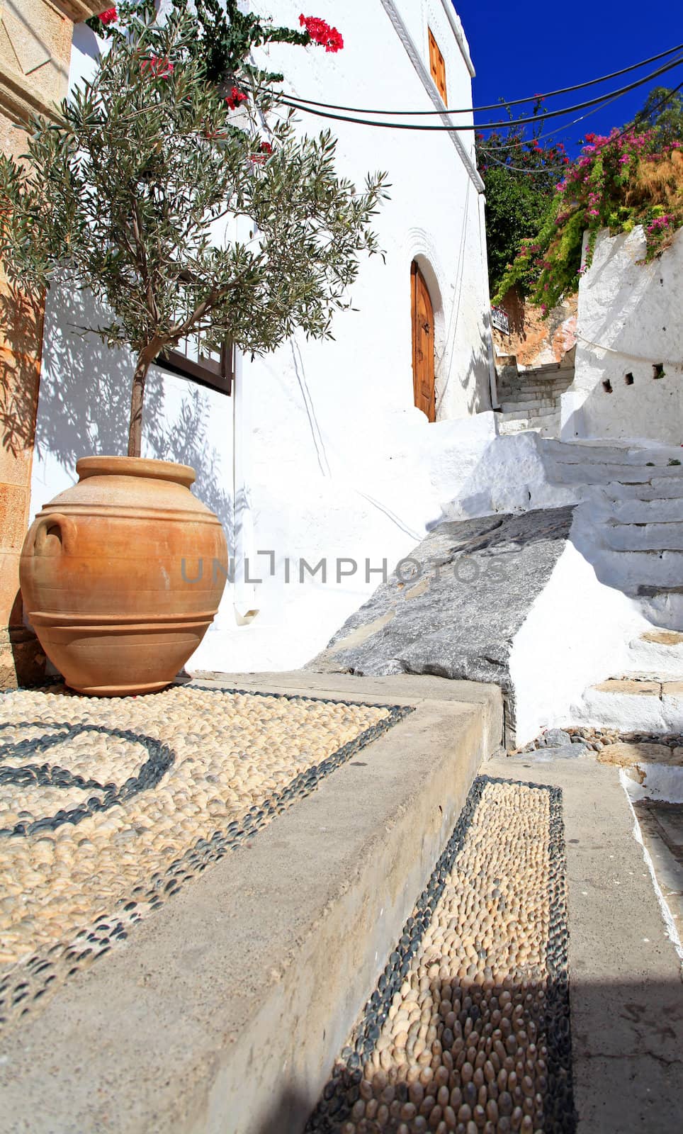 Traditional architecture in the streets and backalleys of Lindos in  Rhodes Greece