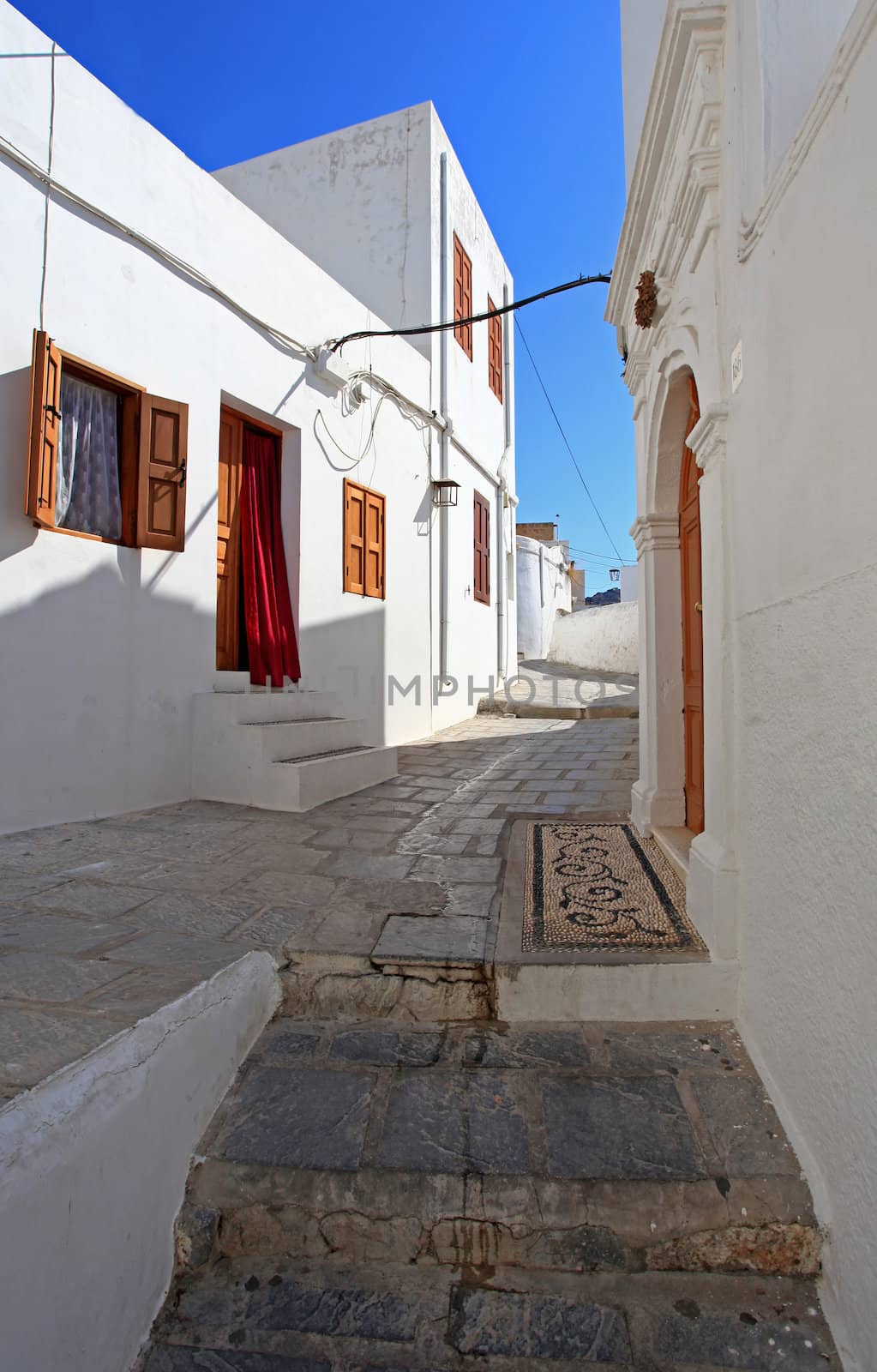 Traditional architecture in the streets and backalleys of Lindos in  Rhodes Greece