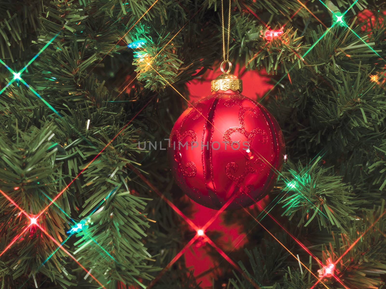 Shining lights and bauble on a Christmas tree