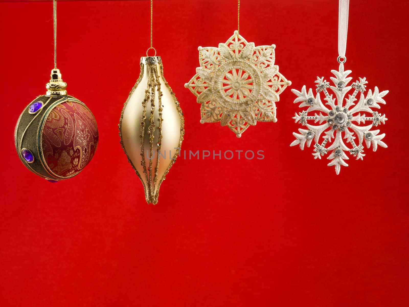 christmas bauble against red background by kozzi