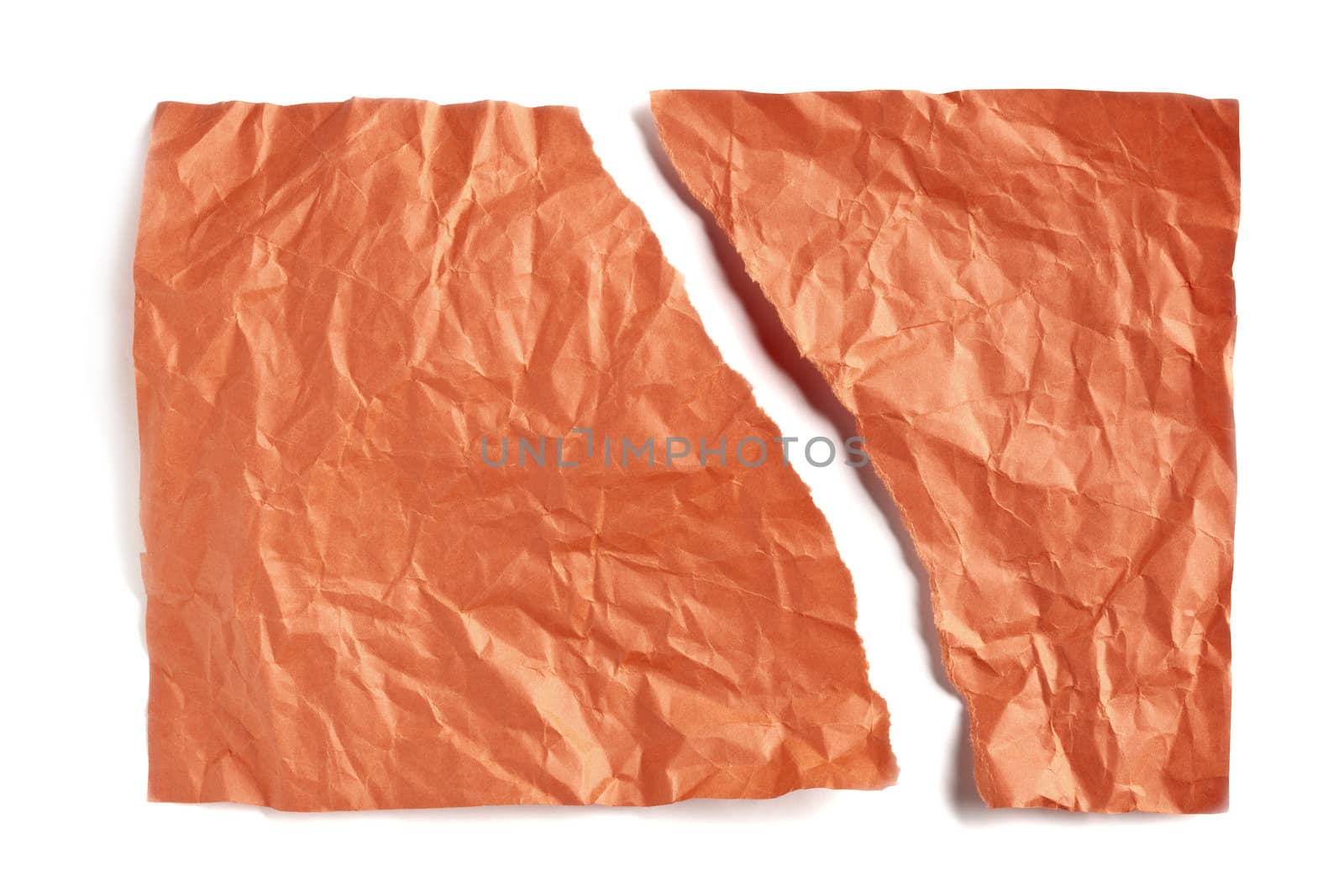 Orange torn and crumpled paper isolated on white background